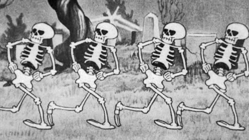 Four animated dancing skeletons from the Disney animated short The Skeleton Dance.